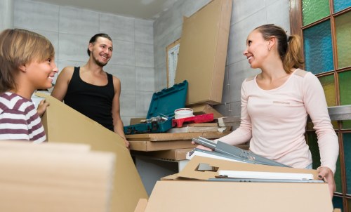 Moving van loading boxes and furniture for a Paddington removal service