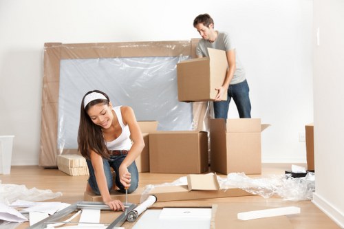 Moving team preparing items with safety checks in Paddington