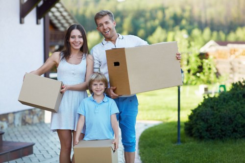 Packed boxes and furniture prepared for a home move in Paddington