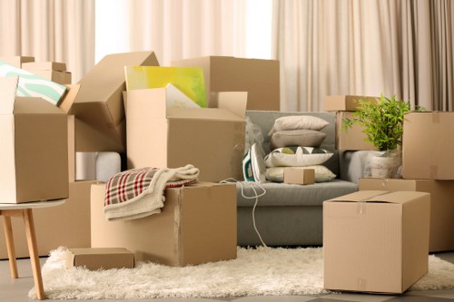 Packed moving boxes and furniture prepared for transport in Paddington